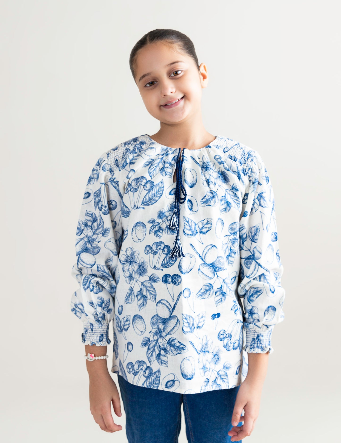 FLORAL PRINTED SMOCKED TOP