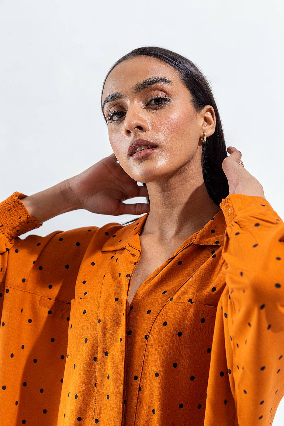 ORANGE AND BLACK POLKA DOT SHIRT