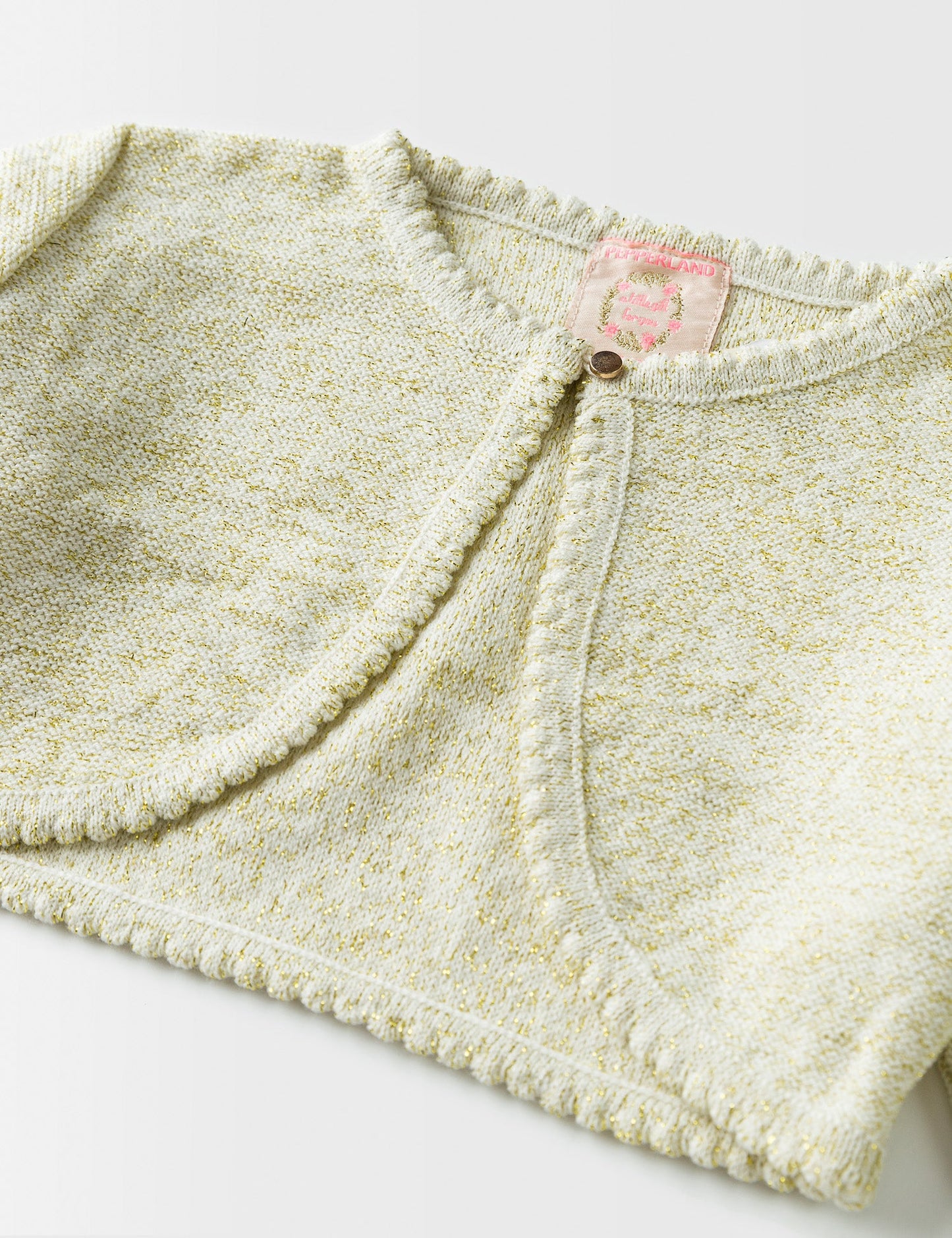 BEIGE SHIMMERY SHRUG