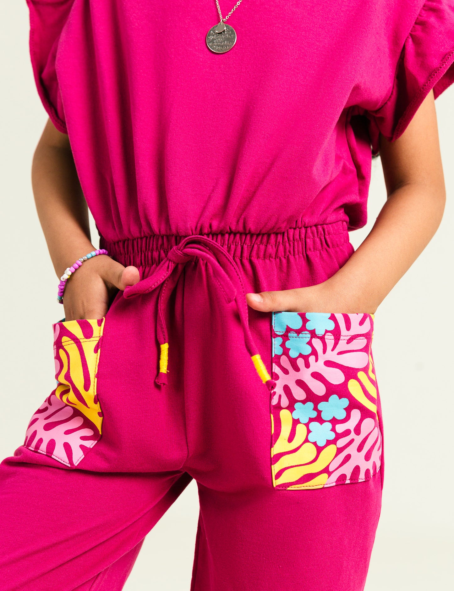 JUMPSUIT WITH PRINTED POCKETS
