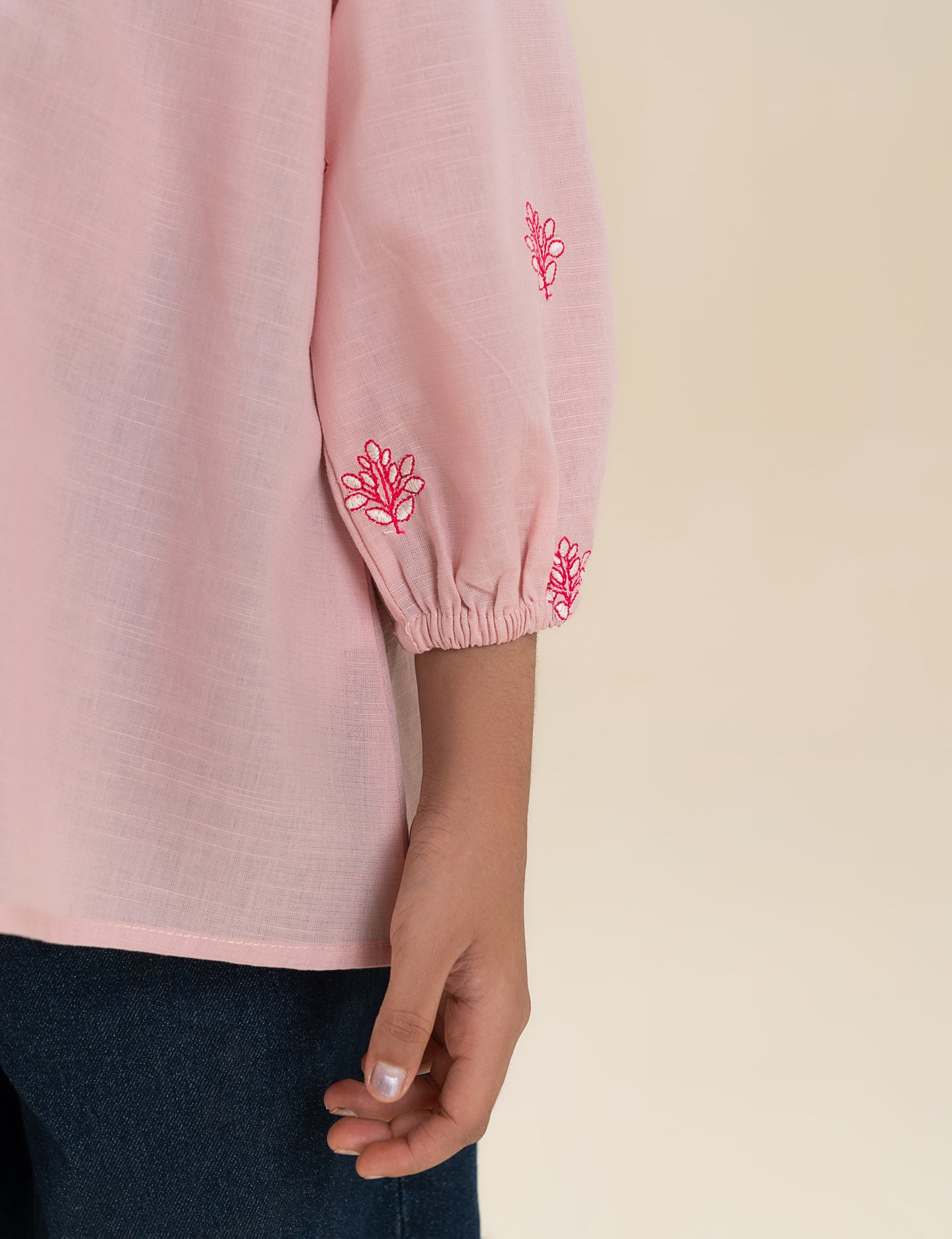 EMBROIDERED TIE-NECK TOP