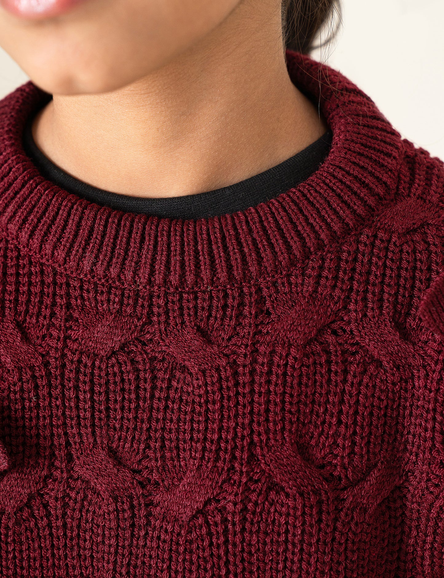 KNITTED SWEATER WITH BOW ACCENTS