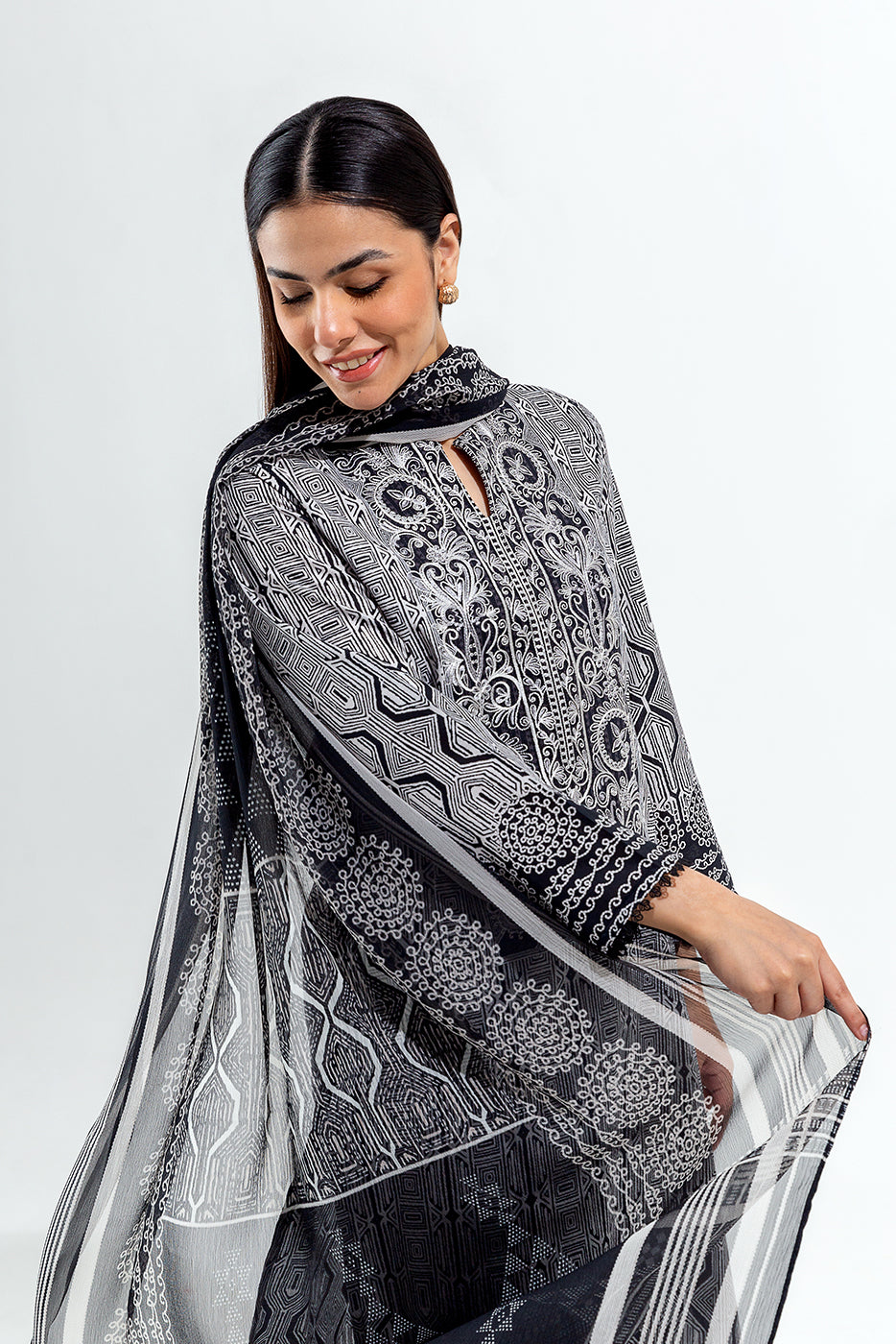 2 PIECE EMBROIDERED CAMBRIC SUIT (PRET)