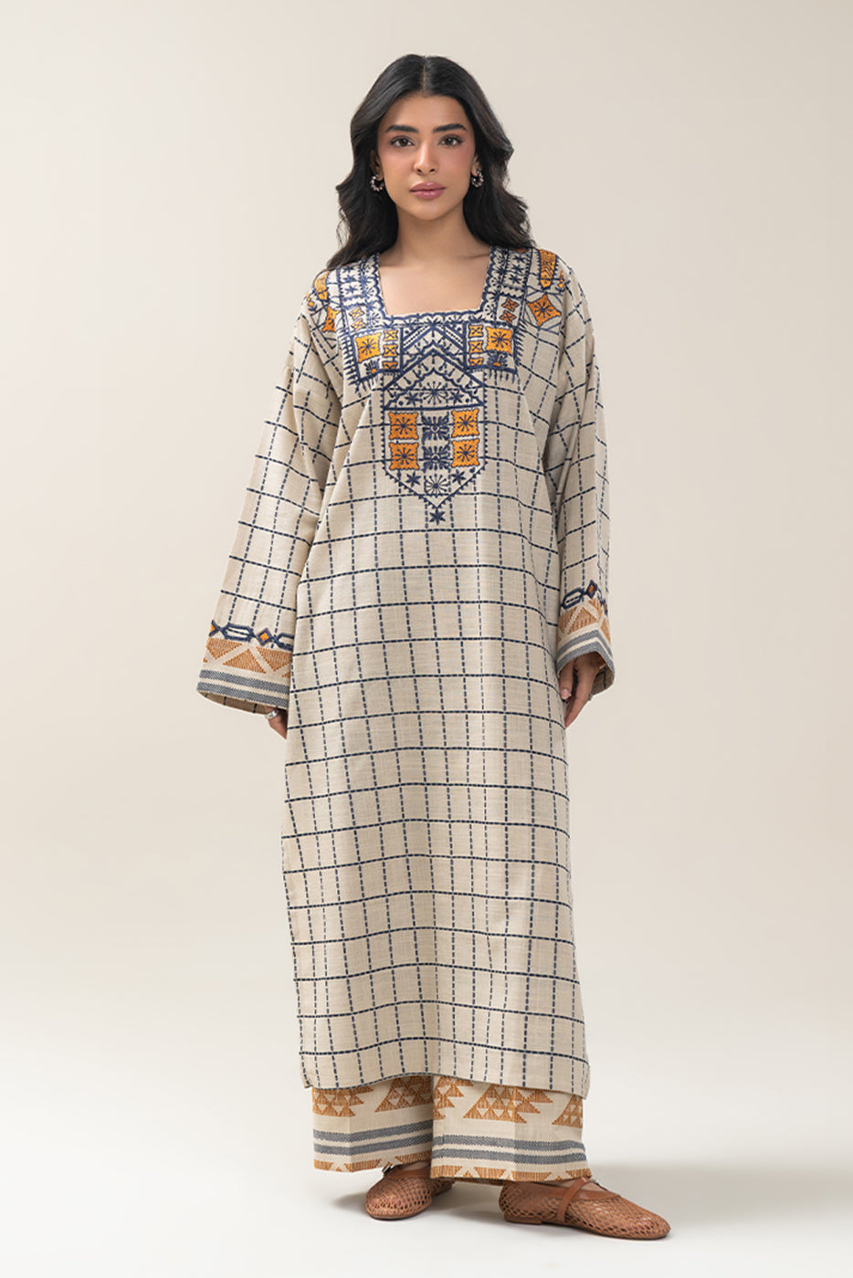 2 PIECE EMBROIDERED KHADDAR JACQUARD SUIT (PRET)