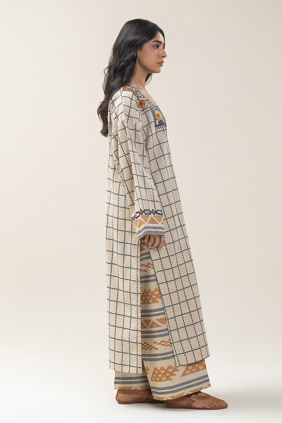 2 PIECE EMBROIDERED KHADDAR JACQUARD SUIT (PRET)