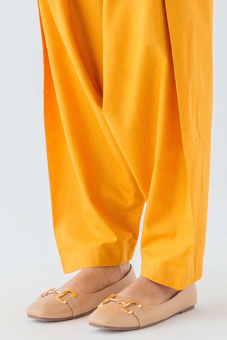 Yellow shalwar in regular fit, perfect for casual wear.