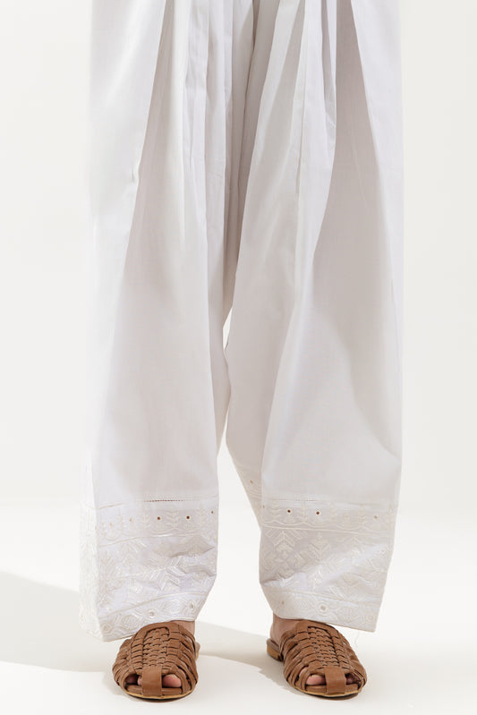 Women's preíëí??í?Œ¢t lower shalwar with elegant embroidered border.