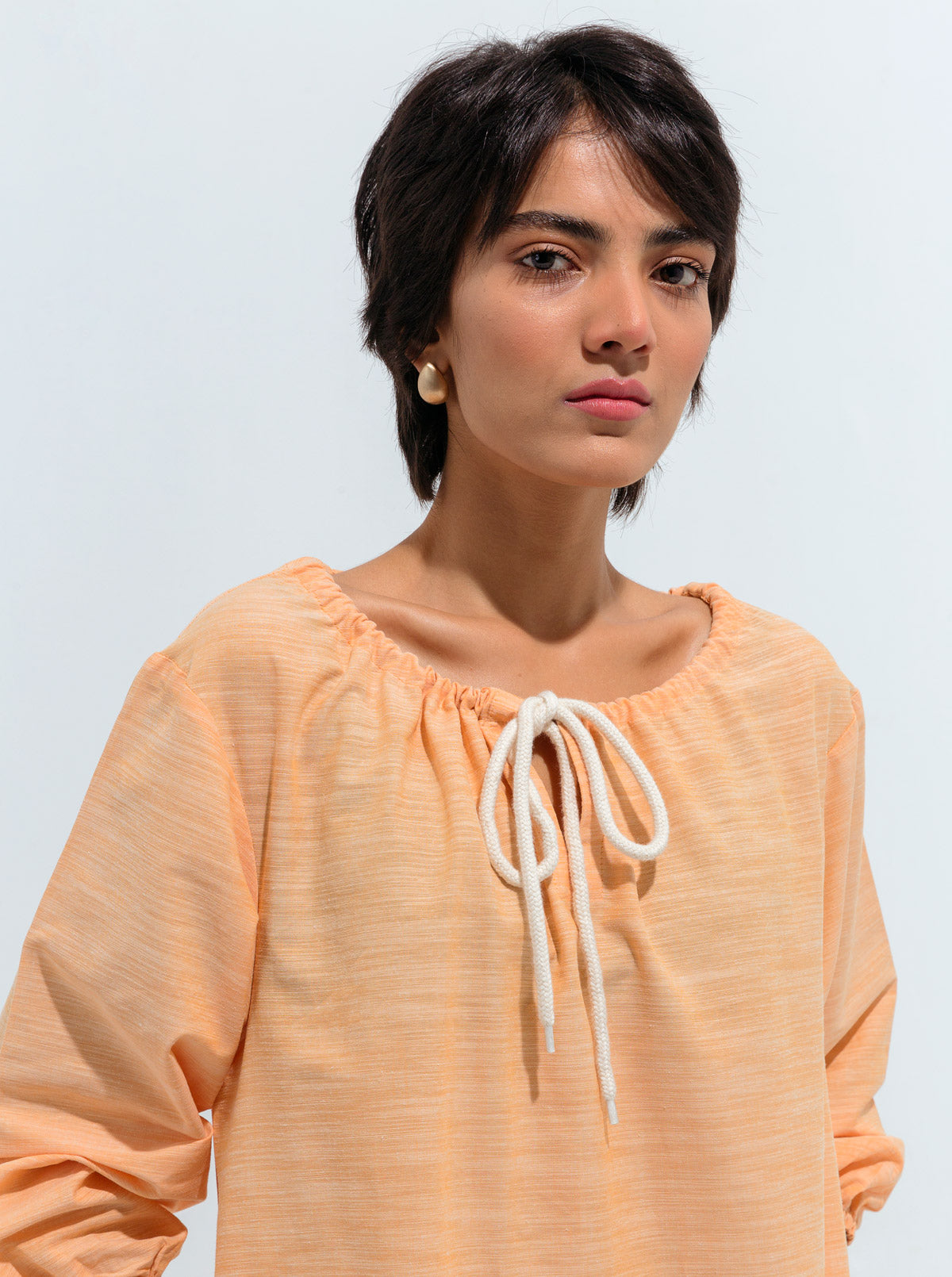 PEACH GATHERED NECK TIE TUNIC